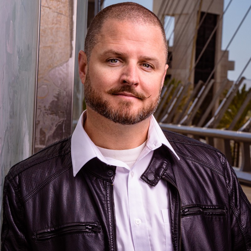 Image of a professional headshot of a man